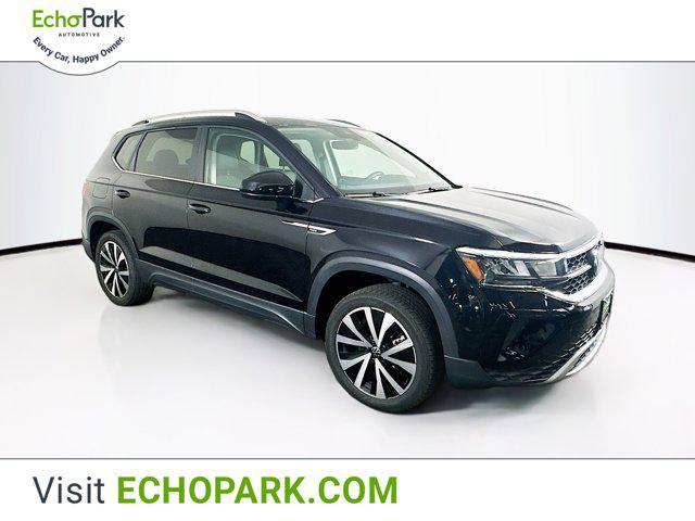 used 2024 Volkswagen Taos car, priced at $20,997