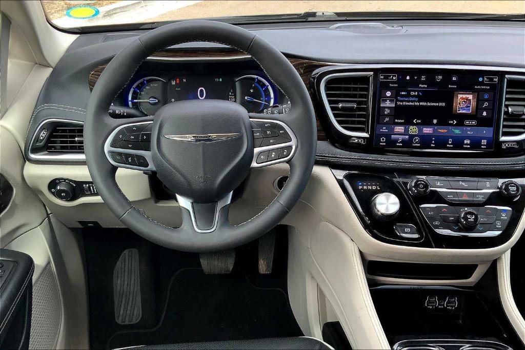 used 2023 Chrysler Pacifica Hybrid car, priced at $29,212