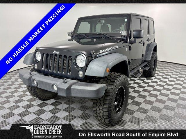 used 2015 Jeep Wrangler Unlimited car, priced at $23,477