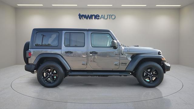 used 2021 Jeep Wrangler Unlimited car, priced at $31,742