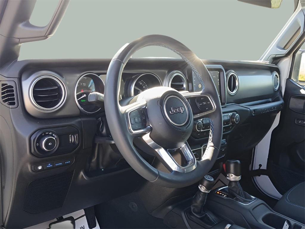 used 2023 Jeep Wrangler 4xe car, priced at $38,997