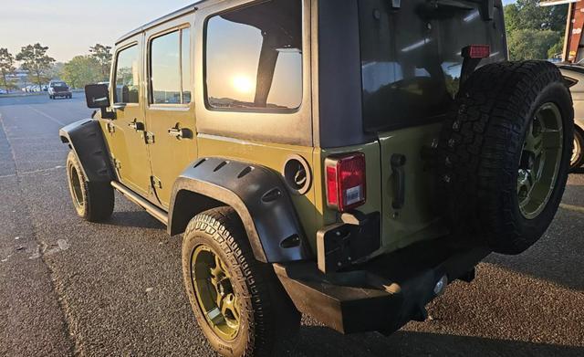 used 2013 Jeep Wrangler Unlimited car, priced at $18,950