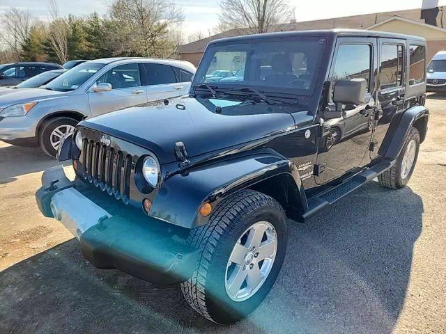 used 2012 Jeep Wrangler Unlimited car, priced at $12,950