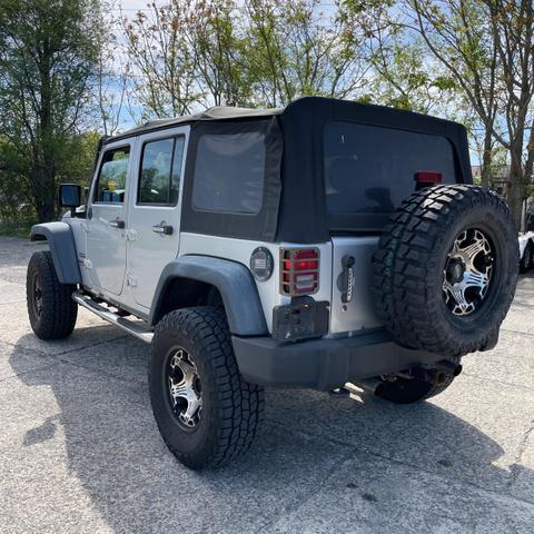 used 2012 Jeep Wrangler Unlimited car, priced at $13,950