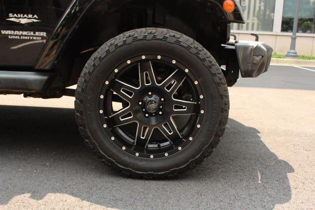 used 2014 Jeep Wrangler Unlimited car, priced at $12,950