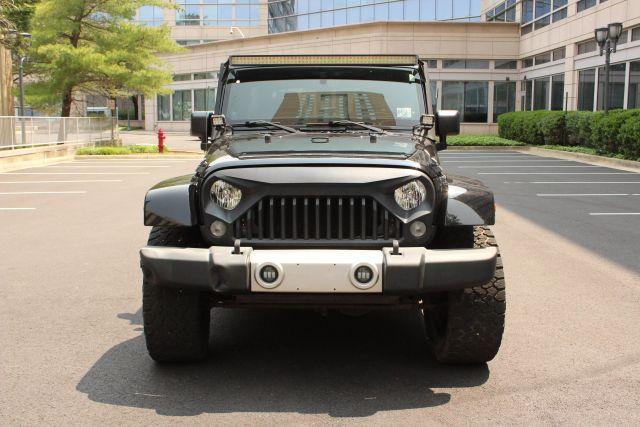 used 2014 Jeep Wrangler Unlimited car, priced at $12,950