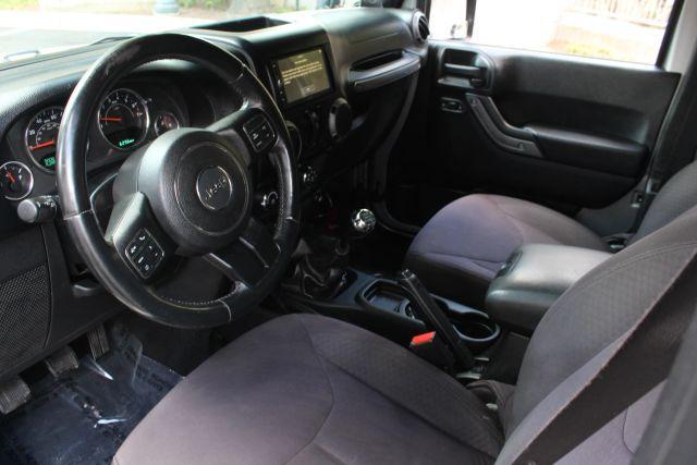 used 2014 Jeep Wrangler Unlimited car, priced at $14,450