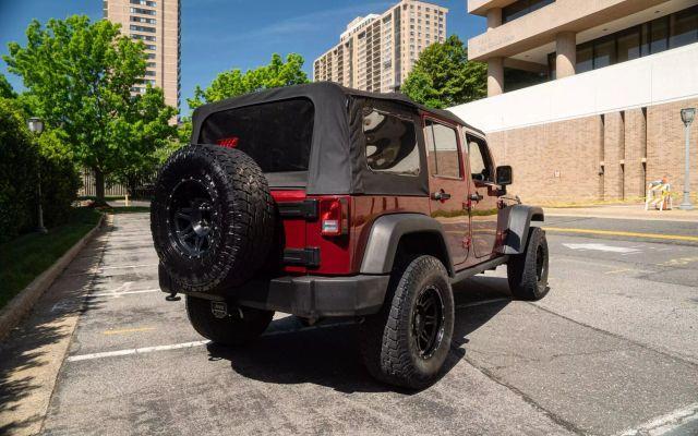 used 2011 Jeep Wrangler Unlimited car, priced at $14,950