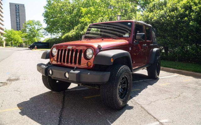 used 2011 Jeep Wrangler Unlimited car, priced at $14,950