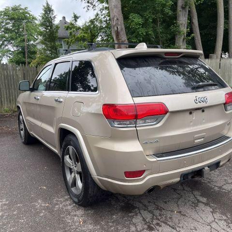 used 2014 Jeep Grand Cherokee car, priced at $13,950