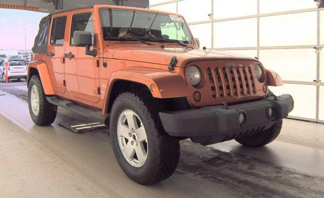 used 2011 Jeep Wrangler Unlimited car, priced at $12,450