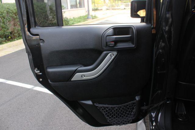 used 2013 Jeep Wrangler Unlimited car, priced at $10,950