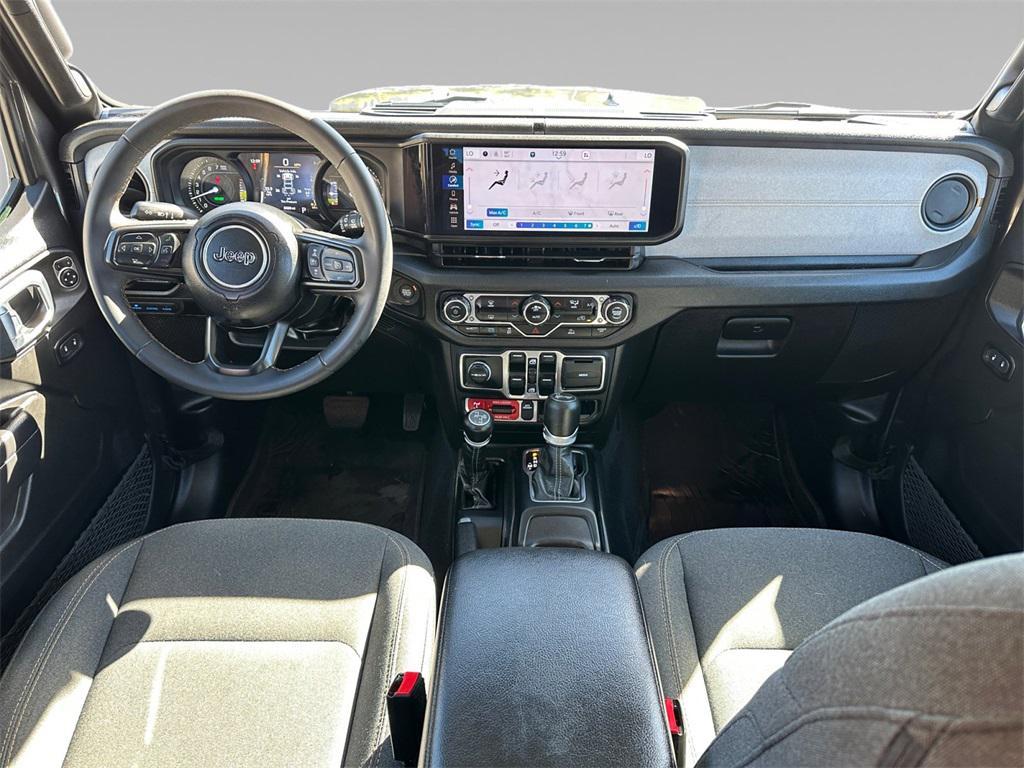 used 2024 Jeep Wrangler 4xe car, priced at $34,272