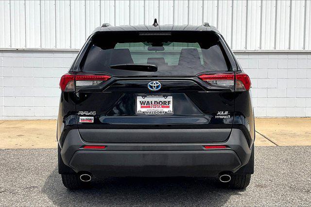 used 2021 Toyota RAV4 Hybrid car, priced at $28,695