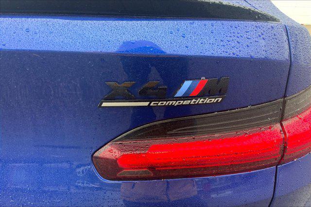 used 2023 BMW X4 M car, priced at $64,695