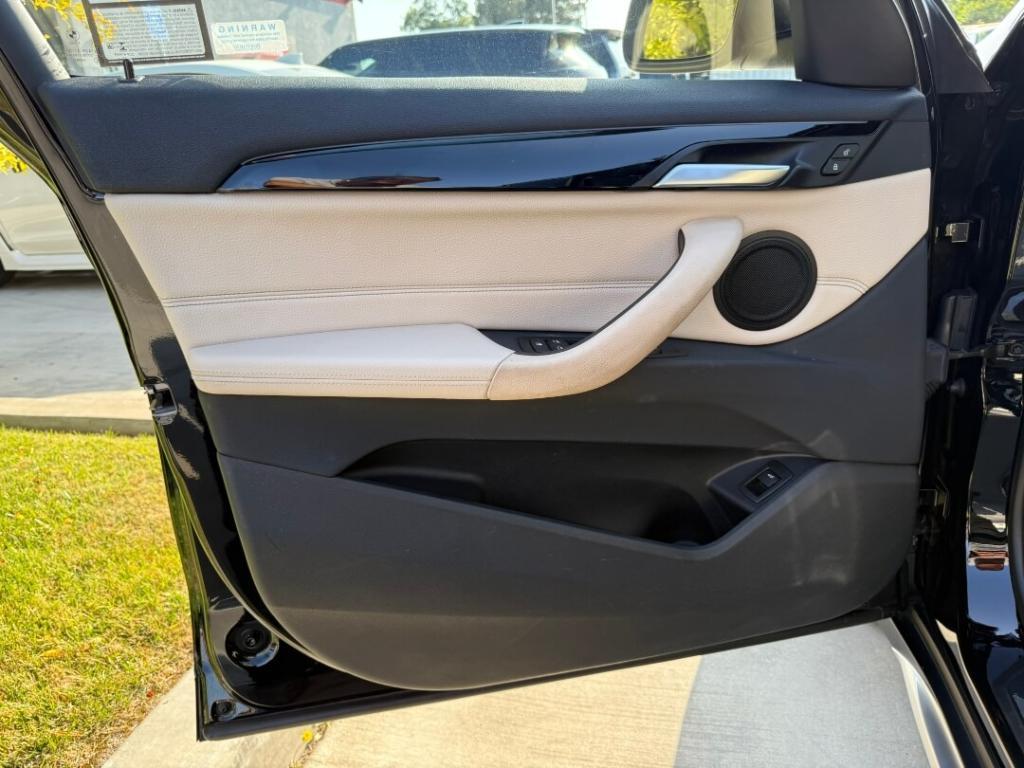 used 2018 BMW X1 car, priced at $19,995