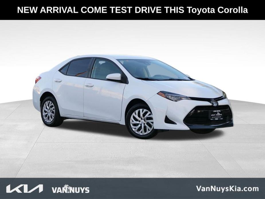 used 2018 Toyota Corolla car, priced at $14,000