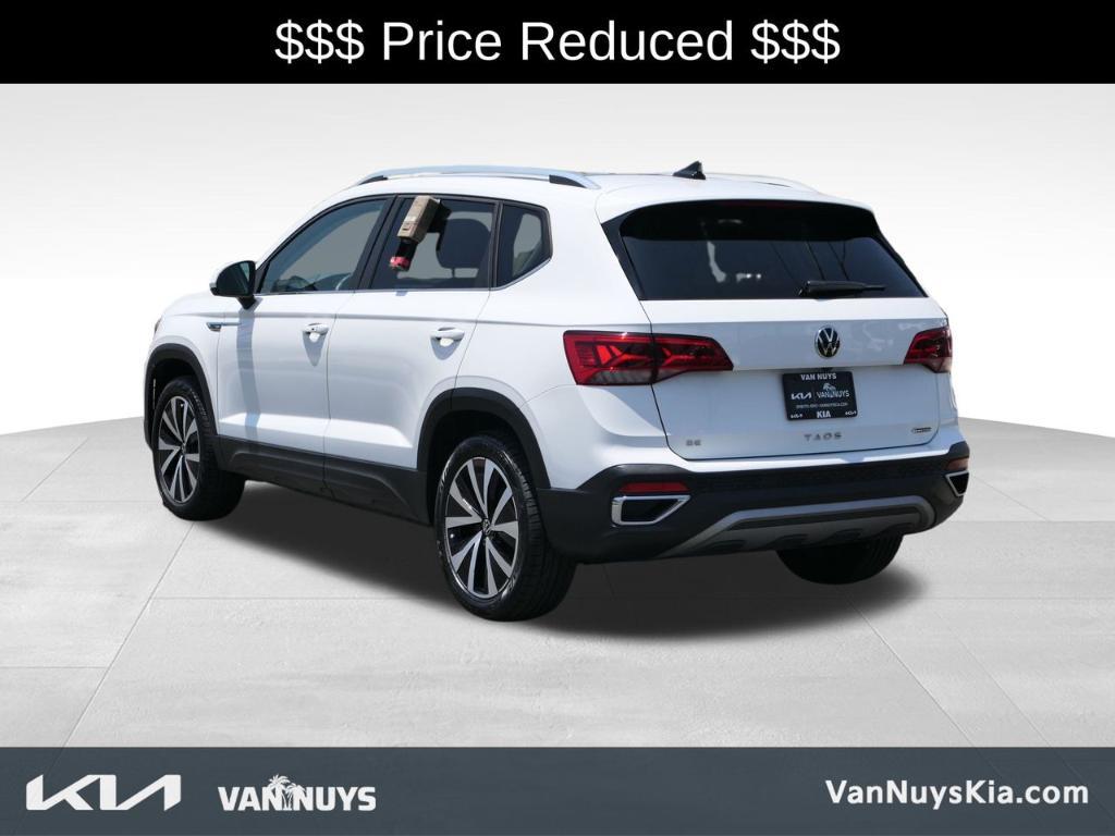 used 2023 Volkswagen Taos car, priced at $19,000