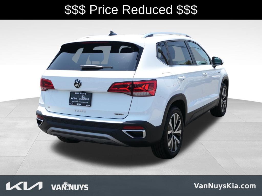 used 2023 Volkswagen Taos car, priced at $19,000