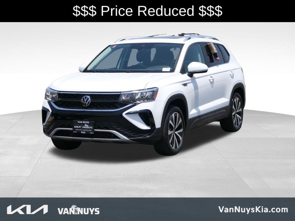 used 2023 Volkswagen Taos car, priced at $19,000