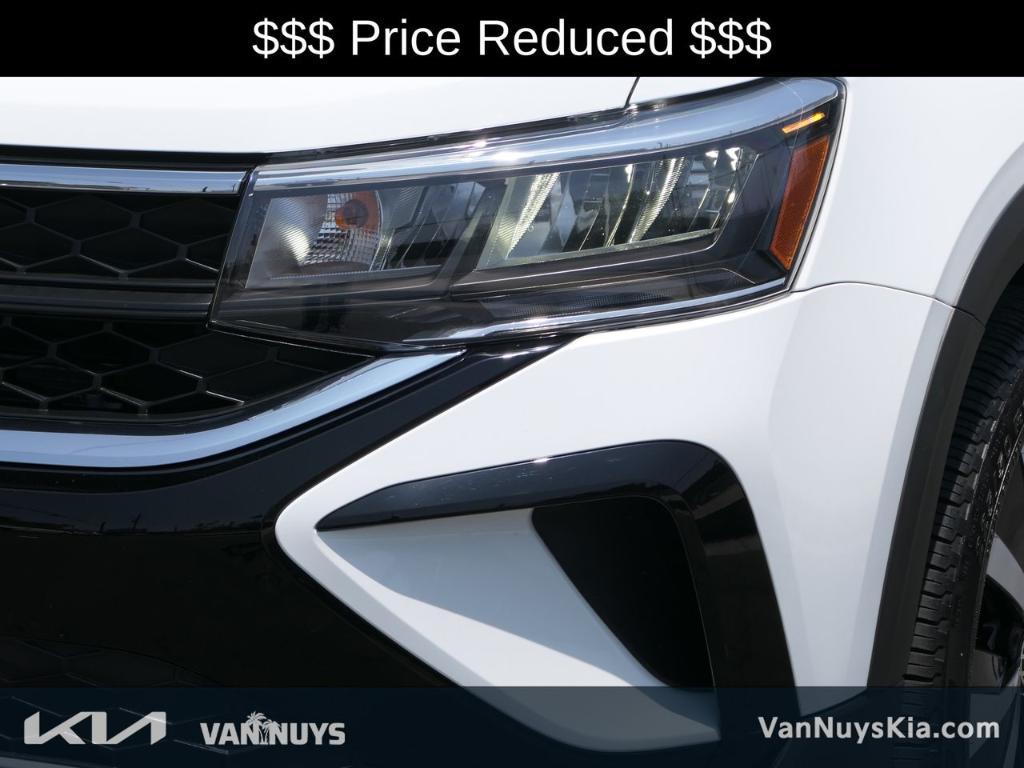 used 2023 Volkswagen Taos car, priced at $19,000