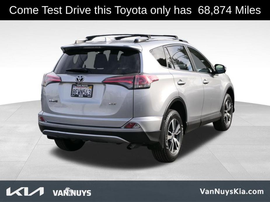 used 2018 Toyota RAV4 car, priced at $19,000