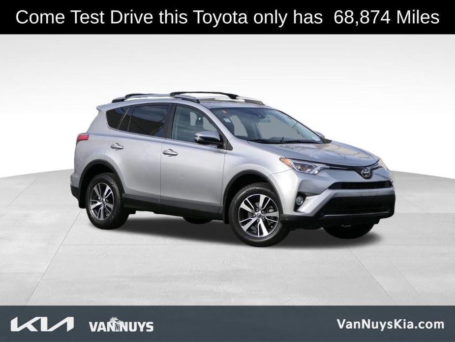 used 2018 Toyota RAV4 car, priced at $19,000