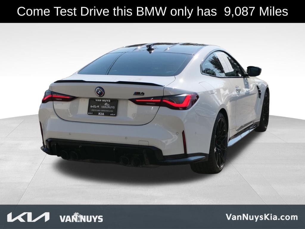 used 2023 BMW M4 car, priced at $77,000