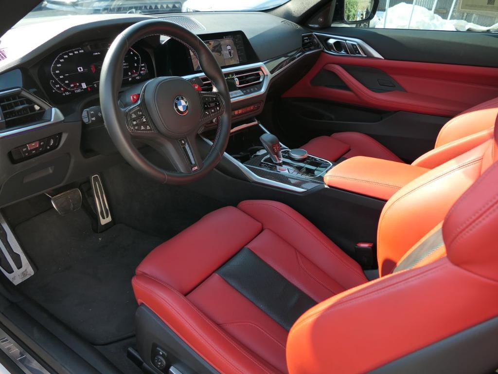 used 2023 BMW M4 car, priced at $77,000