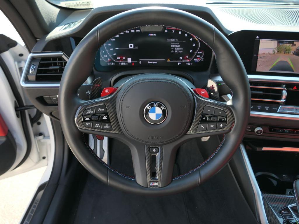 used 2023 BMW M4 car, priced at $77,000