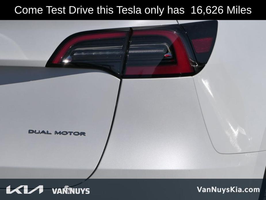 used 2023 Tesla Model Y car, priced at $33,000