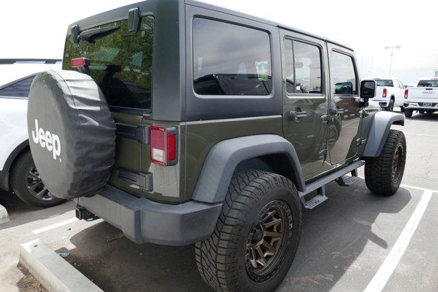 used 2015 Jeep Wrangler Unlimited car, priced at $23,866