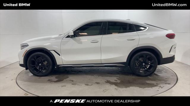 used 2023 BMW X6 car, priced at $61,460