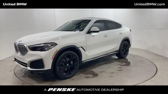 used 2023 BMW X6 car, priced at $61,460