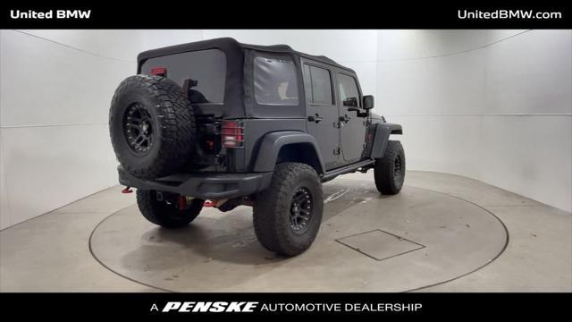 used 2016 Jeep Wrangler Unlimited car, priced at $21,460