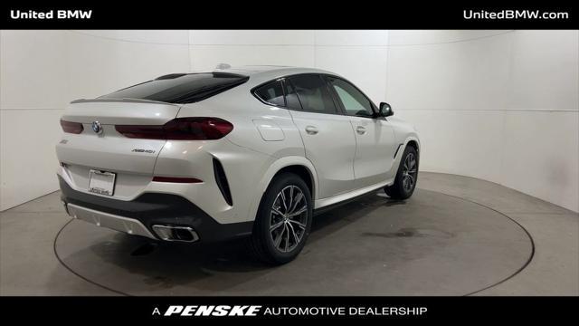 new 2025 BMW X6 car, priced at $77,875