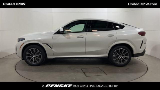 new 2025 BMW X6 car, priced at $77,875