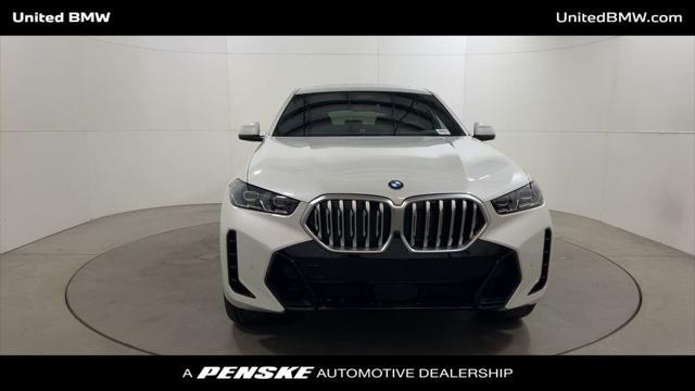 new 2025 BMW X6 car, priced at $77,875