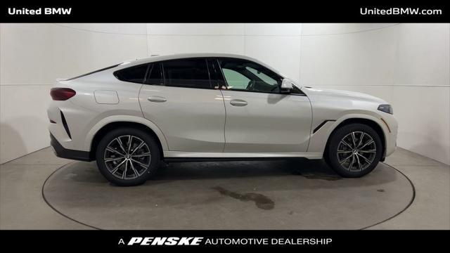 new 2025 BMW X6 car, priced at $77,875