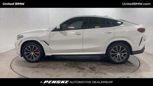 used 2022 BMW X6 car, priced at $57,460