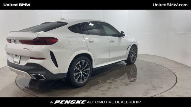 used 2022 BMW X6 car, priced at $57,460