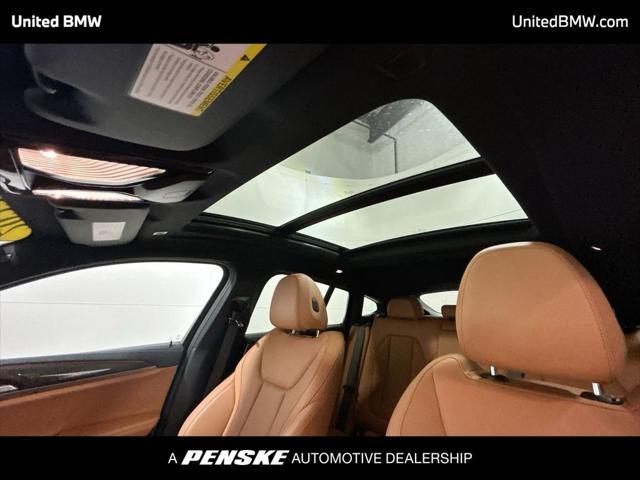 used 2023 BMW X4 car, priced at $49,995