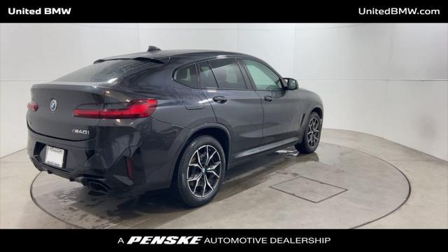 used 2024 BMW X4 car, priced at $64,995