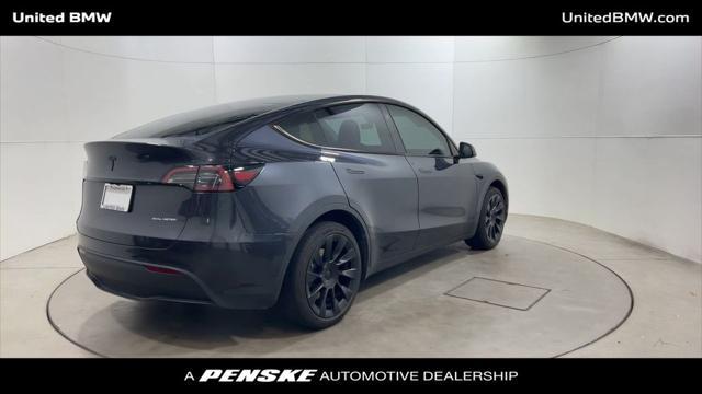 used 2024 Tesla Model Y car, priced at $32,495