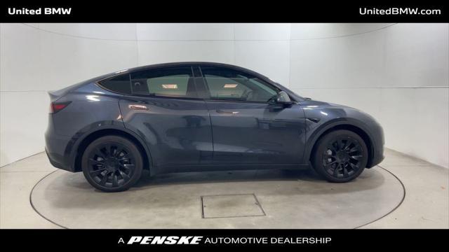 used 2024 Tesla Model Y car, priced at $32,495