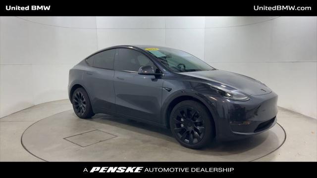 used 2024 Tesla Model Y car, priced at $32,495
