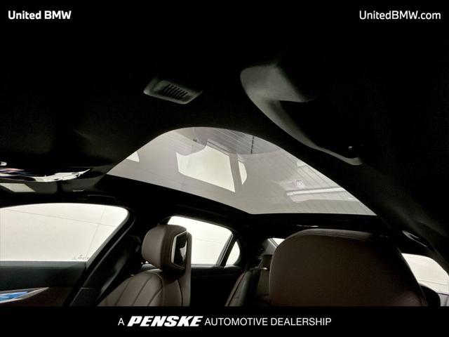 new 2025 BMW 740 car, priced at $104,280
