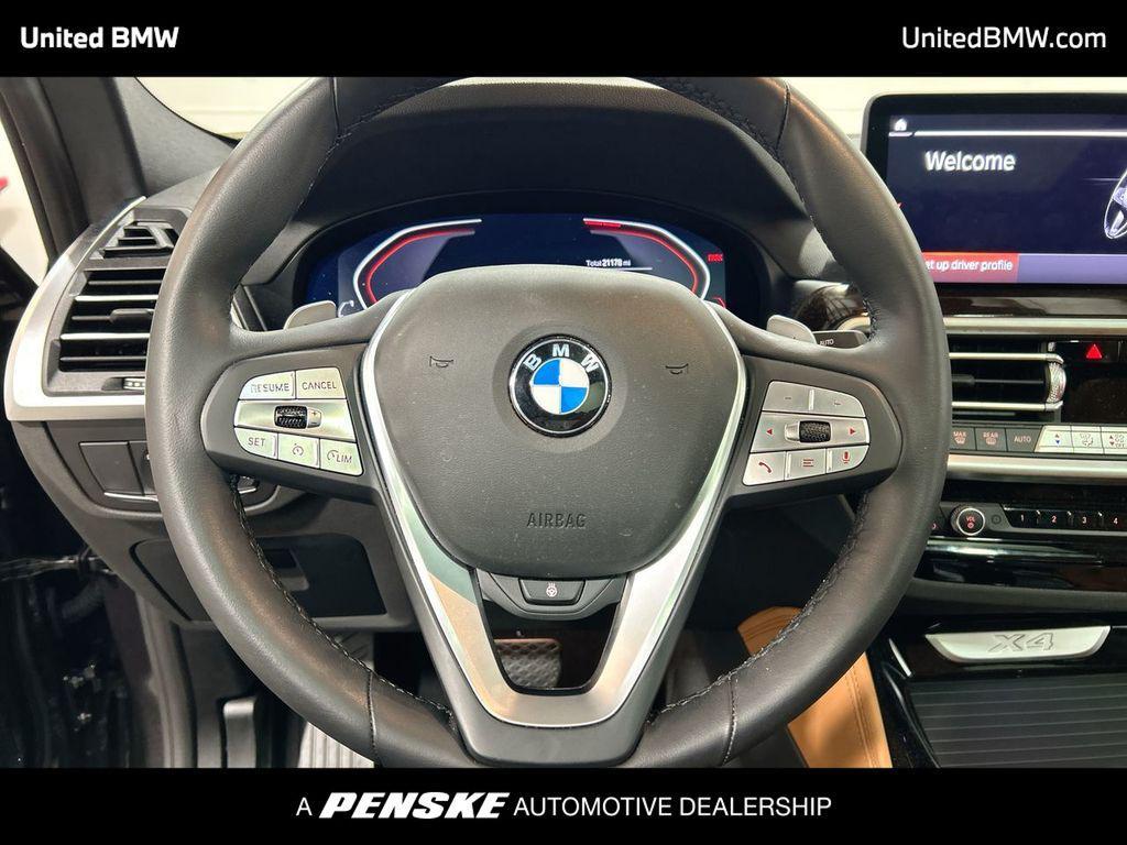 used 2025 BMW X4 car, priced at $47,960