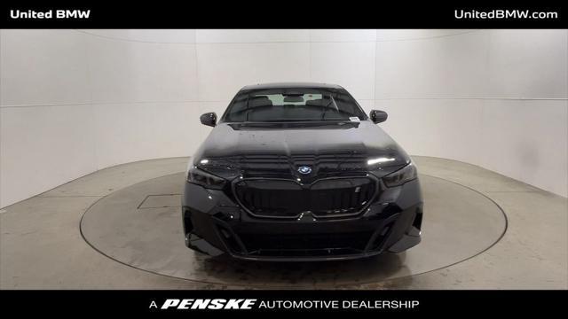 new 2025 BMW i5 car, priced at $74,650