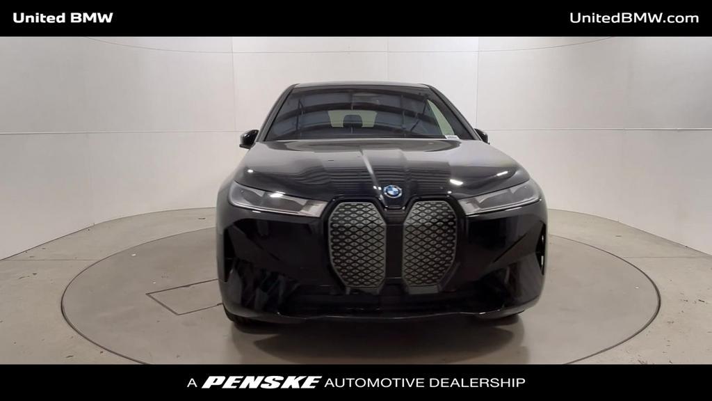 new 2024 BMW iX car, priced at $96,010
